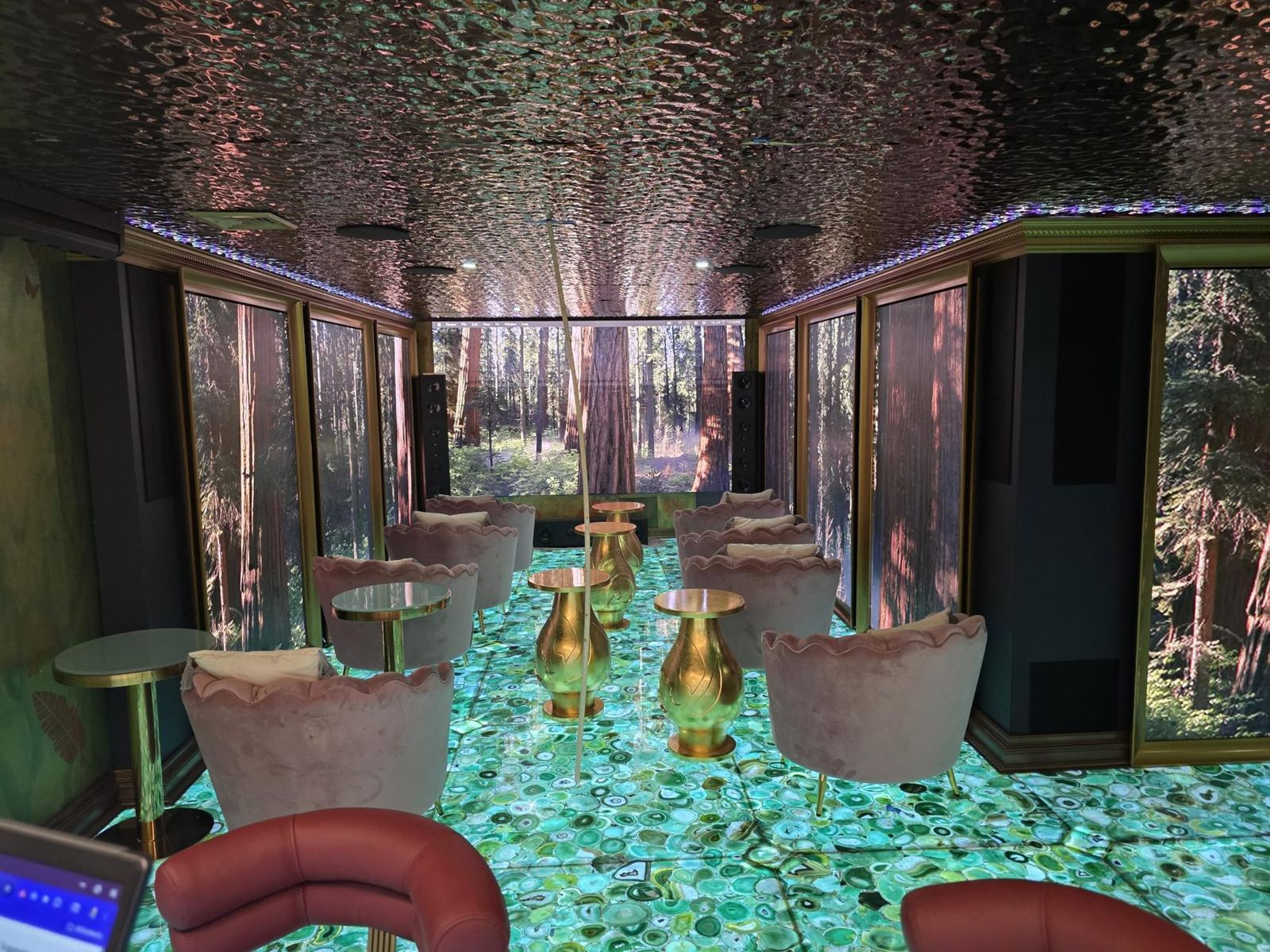 Theater lounge facing the main LED wall